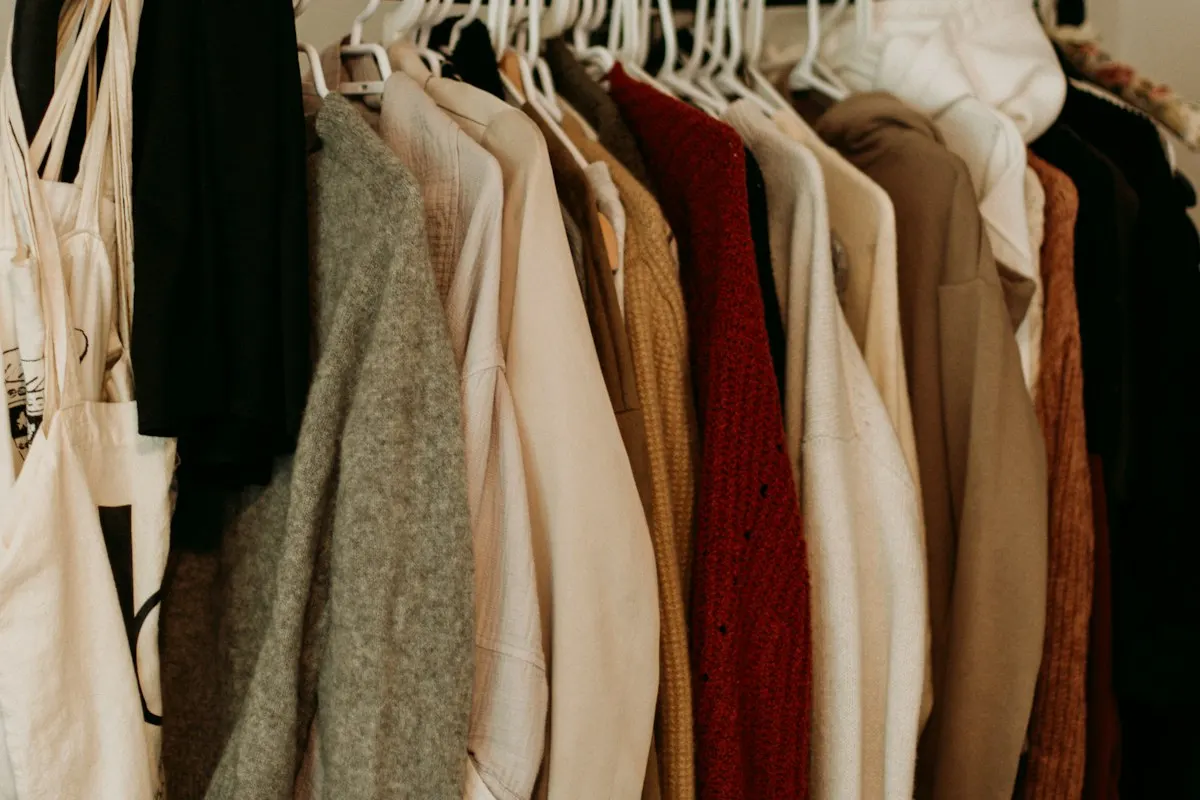 Clothes arranged along a hanging rail