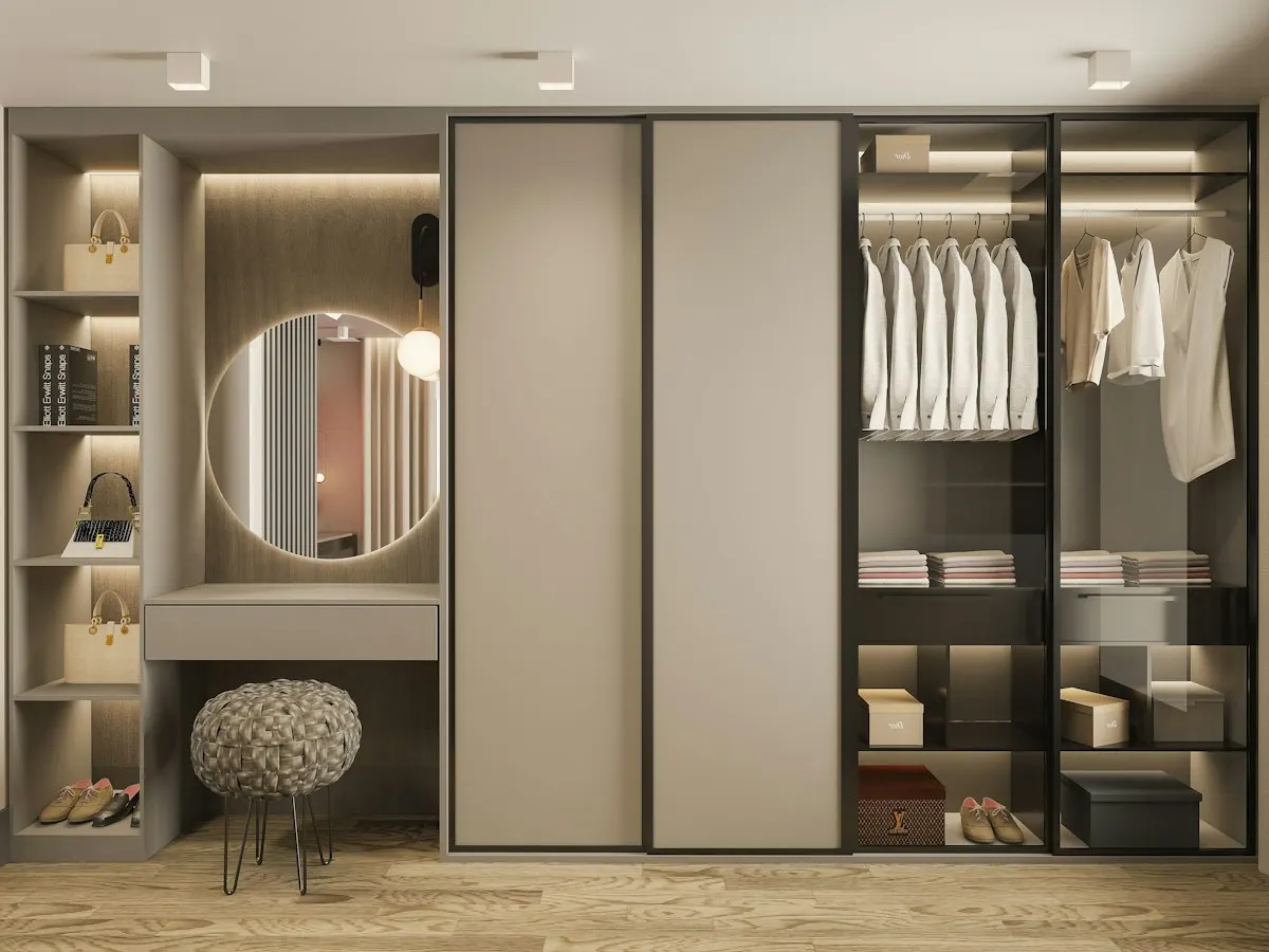 Fitted wardrobe with a mirror and illuminated shelves