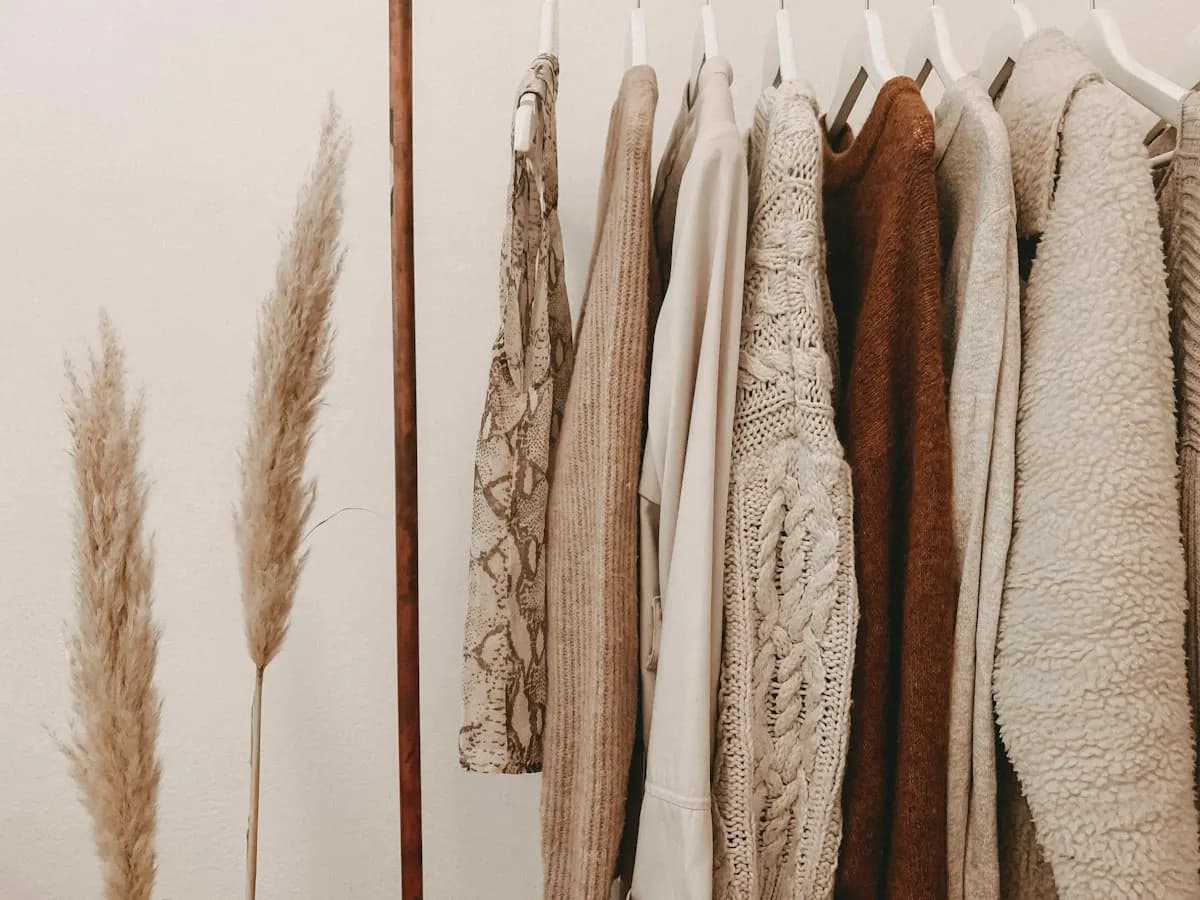 Small freestanding clothes rail beside a wall