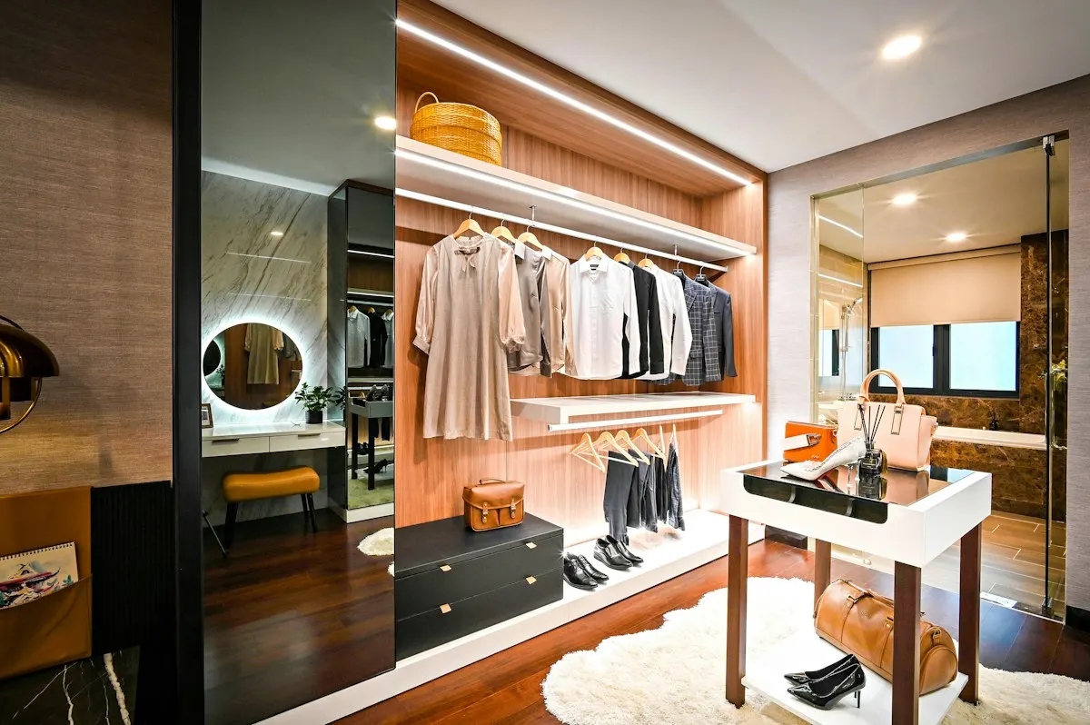 Dressing area with illuminated rails and a central counter